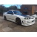 Nissan Skyline R34 GTT East Bear Spec 2 Front Bumper with Splitter - NEW IMPROVED!